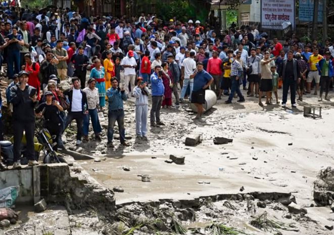 Massive flash floods in Nepal leave many Indian tourists stranded and missing near the Tibet border