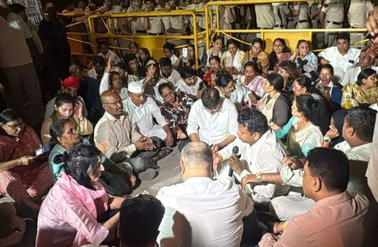 Delhi Police detaining AAP leader Saurabh Bharadwaj and other MLAs during a midnight protest outside Vikaspuri Police Station