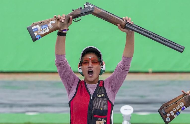 Indian shooter Neeru Dhanda aiming with her shotgun during the women's individual trap event at the Asian Games 2026