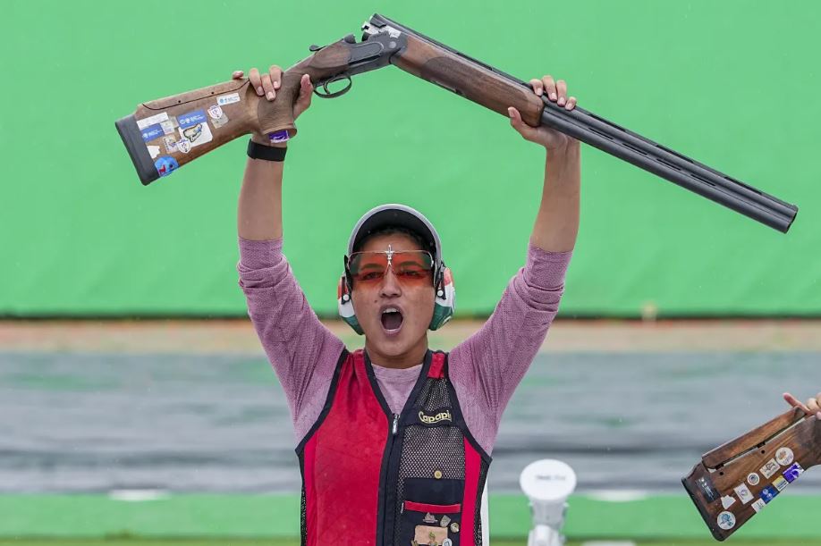 Indian shooter Neeru Dhanda aiming with her shotgun during the women's individual trap event at the Asian Games 2026